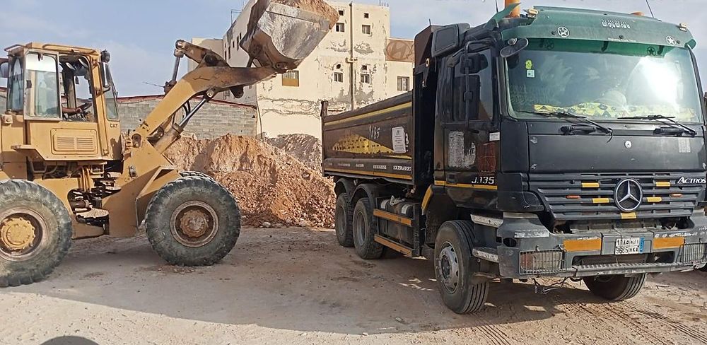 Loader and dump truck